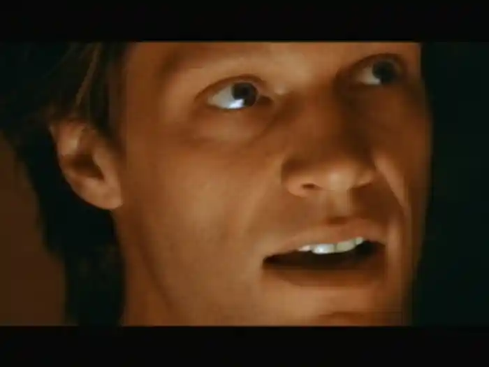 Staring At Your Window With A Suitcase In My Hand (Spanish Version)