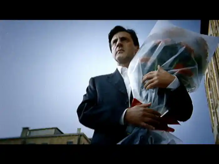 L'homme au bouquet de fleurs