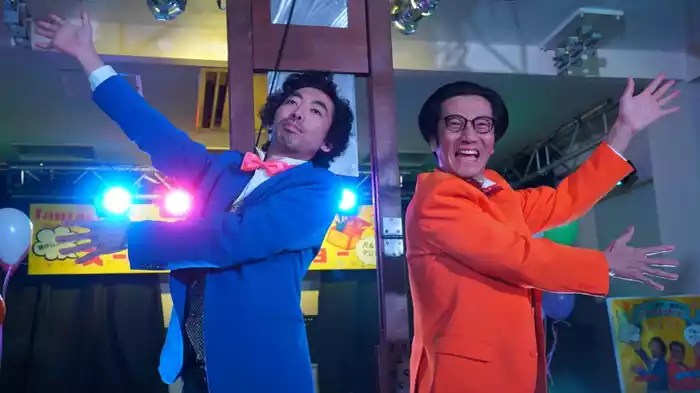 「笑うマジシャン」