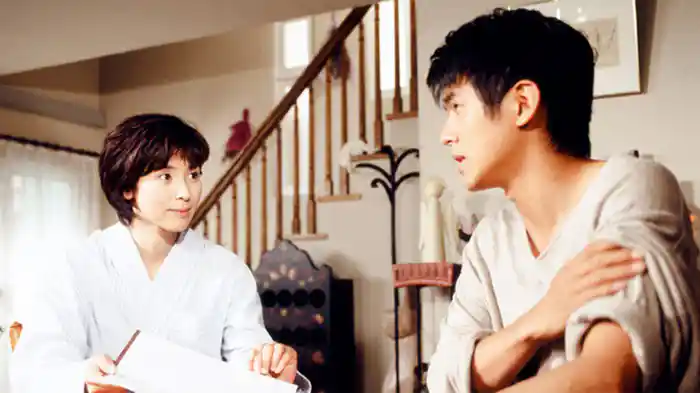 『雨に抱かれて…』